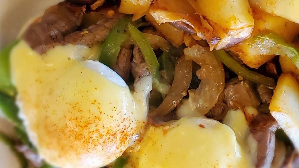 Tri-Tip Benedict* · Angus Sirloin cooked to perfection, Bell peppers, Poached Eggs, Fresh Jalapeños & Avocado, on an English Muffin topped with Hollandaise Sauce.