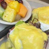 BlackStone Benedict* · Grilled red onions, avocado and tomatoes on an english muffin topped with Hollandaise sauce.