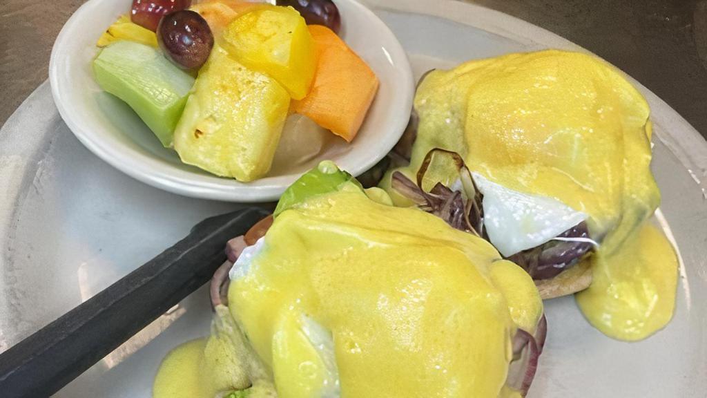 BlackStone Benedict* · Grilled red onions, avocado and tomatoes on an english muffin topped with Hollandaise sauce.