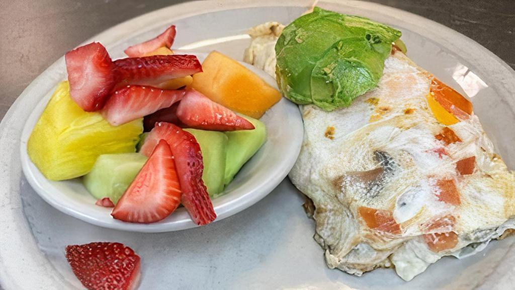 Fitness Group Omelette · Egg white omelette filled with turkey burger, tomatoes, mushrooms, avocados and cheddar cheese. Served with fresh fruit and toast.