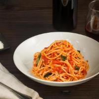 Spaghetti Pomodoro · plum tomatoes, garlic, extra virgin olive oil, pepperoncini