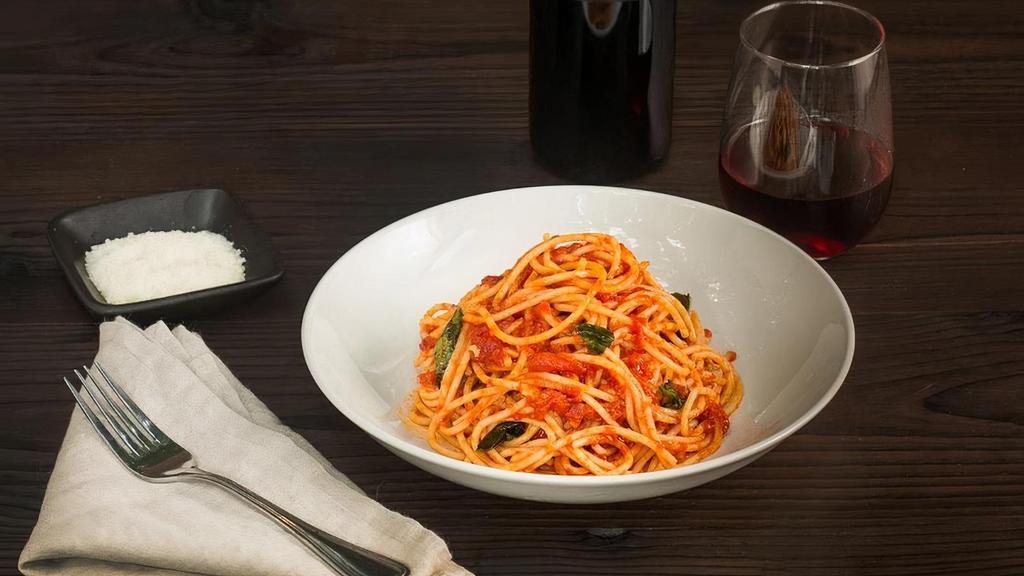 Spaghetti Pomodoro · plum tomatoes, garlic, extra virgin olive oil, pepperoncini