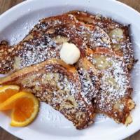 French Toast · Sourdough, orange zest-cinnamon egg batter, powdered sugar, whipped butter, served with mapl...