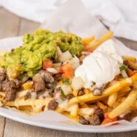 California Fries · French fries topped with carne asada melted cheese, pico de gallo, sour cream and guacamole.