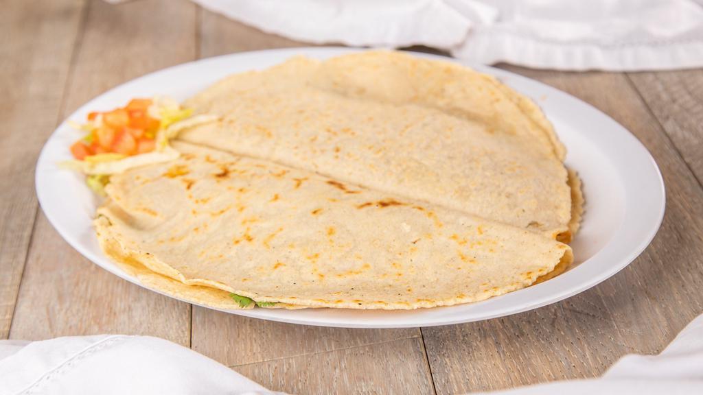 Regular Quesadilla · Flour tortilla with melted cheese.