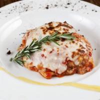 Lasagna Classica · Baked with our bolognese, fresh mozzarella, and béchamel.