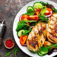 Chicken Grilled Salad with Avocado · Fresh green salad prepared with romaine lettuce, Grilled chicken, avocado, a mix of fresh ve...