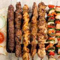 Combination Kabab · Hot & Tasty kababs cooked to perfection, prepared to customer's choice. Served on a bed of r...