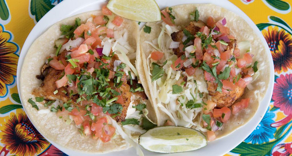 Grilled Fish Tacos · Pacific snapper w/ salsa fresca, habanero mayo, cabbage, and lime