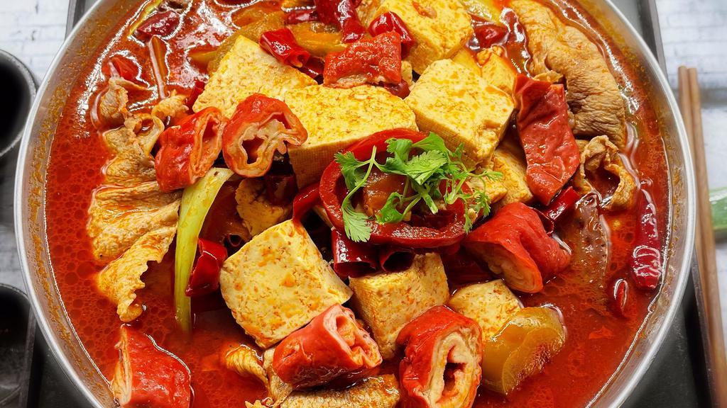 Taiwan Stinky Tofu Wok   台湾臭臭锅 · Extra spicy. Pork, pepper, pork blood mushroom, stinky tofu, pork intestine, and bok choy.