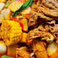 Grandma Curry Wok   外婆咖喱锅 · Spicy. beef carrots mushroom corn, meatballs fish balls fish cake, crabmeat tempura tofu, fi...
