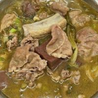 130. Iron Pot Sour Cabbage with Lamb Pork Ribs   客家酸菜一锅出 · Spicy.