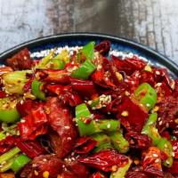 223. Pork Intestine with Explosive Chili Pepper      干煸肥肠 · Hot and spicy.