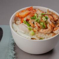 Grilled Shrimp Bowl · A bowl filled with grilled shrimp over steamed rice, with kimchi, scallions, and fried egg.