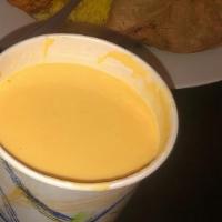 Mango Lassi · Refreshing yogurt drink blended with mango pulp.