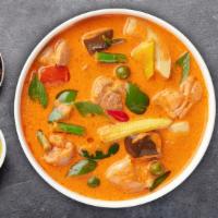 Blazing Panang Curry Bowl · Red curry paste with coconut milk, bell peppers, onions, basil and your choice of protein on...