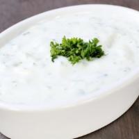 Mast o Sir · Yogurt with shredded cucumber, fresh dill and a hint of garlic.
