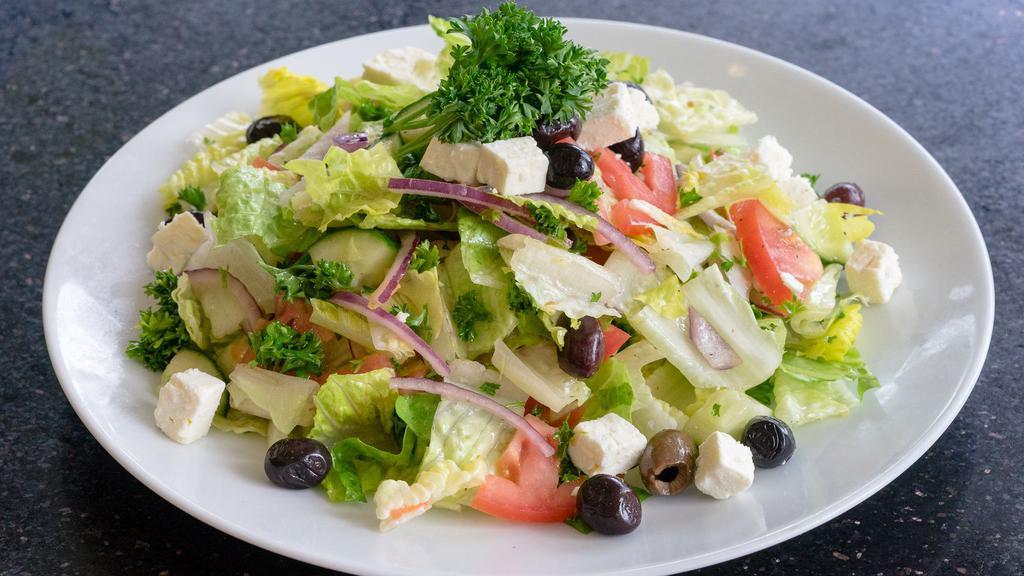 Greek Salad · Romaine lettuce, fresh tomato, cucumber, red onion, kalamata olives and feta cheese.