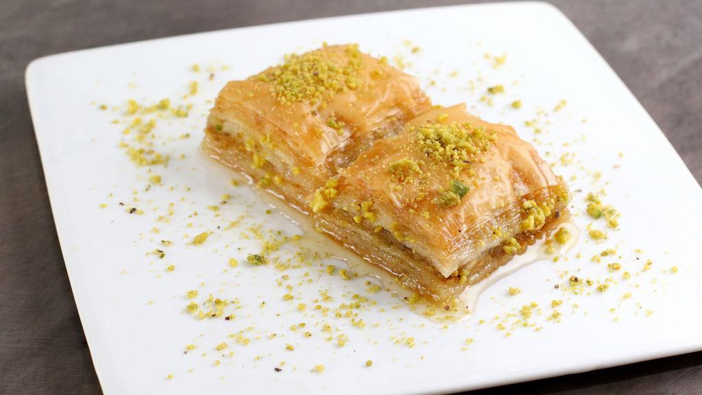 Baklava · Layers of filo dough and pistachios baked with our own homemade syrup.