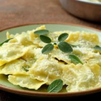 Ravioli · Pasta filled with ricotta and Parmesan cheese or beef with your choice sauce.
