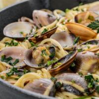 Linguine Alle Vongole · Fresh garlic, Manila clams, Italian parsley, white wine sauce.