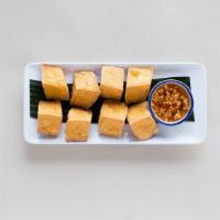 Golden Tofu · Crispy deep fried tofu serve with crush peanut in sweet and sour sauce