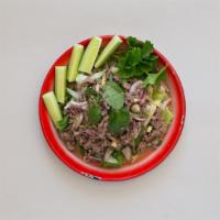 Larb · Choice of minced pork, chicken or beef, red onion, mint, fresh lime juice, cilantro, roasted...