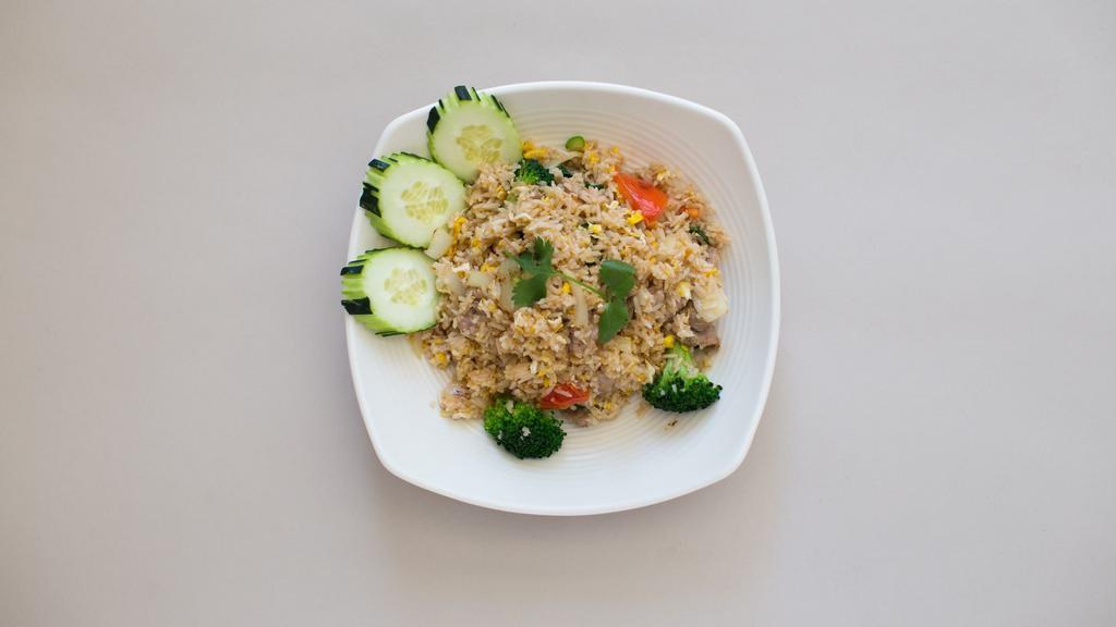 Fried Rice · Choice of meat, egg fried rice, Chinese broccoli, tomato, onion.