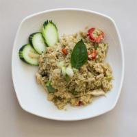 Green Curry fried rice · Green curry sauce sautee with rice, basil, green and red bell pepper, zucchini, onions.