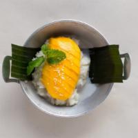 Sweet Sticky Rice With Mango · Sweet coconut rice with fresh mangoes, topping with sesame and coconut milk.