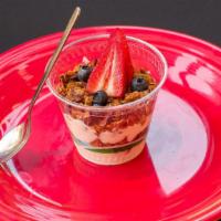 Granola Yogurt Parfait · Hand made honey yogurt layered with our made-from-scratch granola, topped with strawberries ...