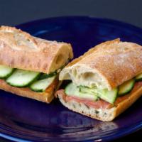 Smoked Salmon · Smoked Norwegian salmon, sliced English cucumbers, and our house caper-dill butter.