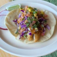 Fish Taco**** NEW MONTHLY SPECIAL**** · One large handmade corn tortilla, beer-battered fish deep fried to perfection. Topped with C...