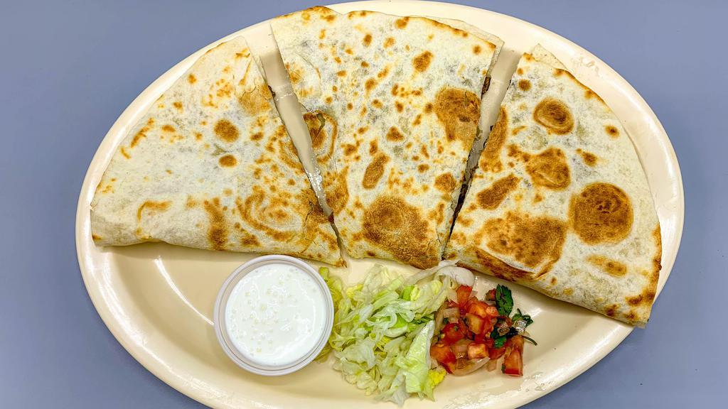 Super Quesadilla · Flour tortilla with cheese and choice of meat.