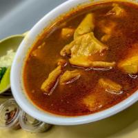 Menudo · A delicious traditional Mexican soup.
 served with a side of onions,cilantro, lime, oregano ...