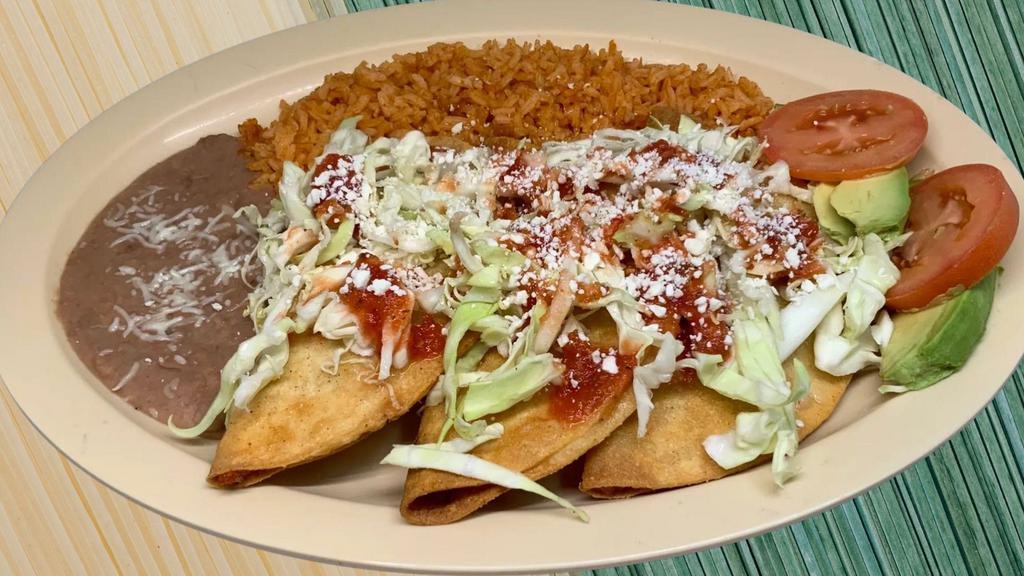 Crispy Potato Taco Plate  · Three crispy tacos filled with potato, deep fried to perfection, and topped with cabbage, new special red salsa and cotija cheese. Served with rice, beans and garnished with slices of tomato and avocado.