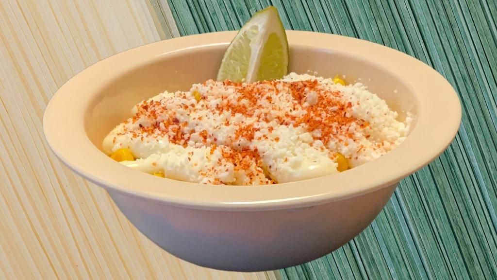 Mexican Street Corn Bowl · Fresh corn cut off the cob topped with Mayonnaise, Cotija cheese and chile powder.