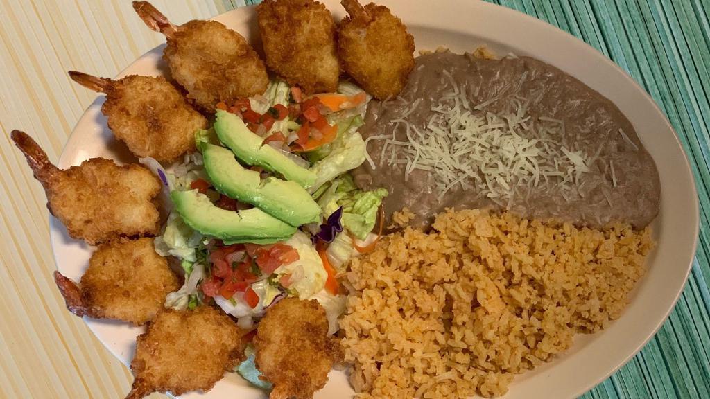 Camarones Empanizados · Breaded shrimp, deep fried to perfection. Served with rice, beans, and handmade corn tortillas.