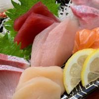 Sashimi Moriawase  · Chef's choice of 12 pieces sashimi, served with steamed rice.