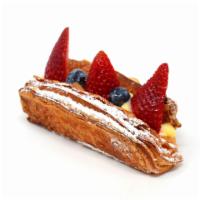 Danish Fruit Boat 丹麥水果船 · Custard filling at the bottom, lined with strawberries and blueberries, and finishes with po...