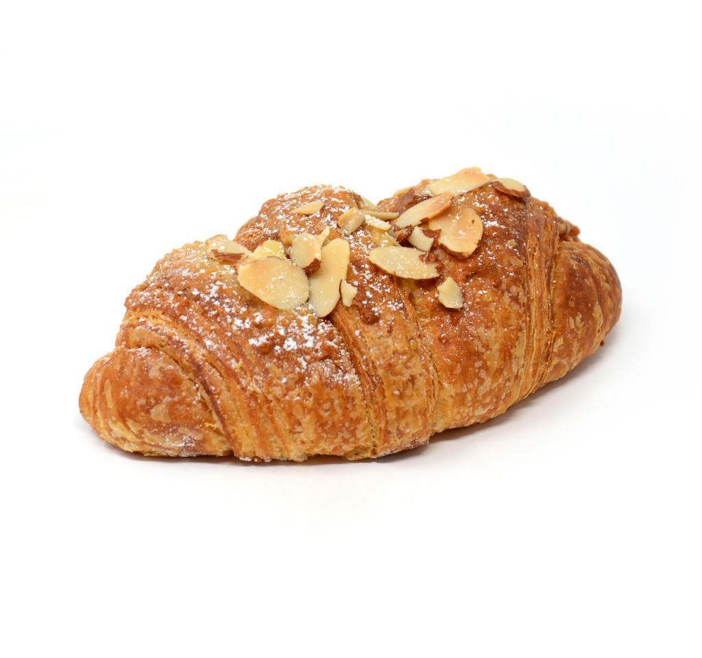 Almond Croissant 牛角杏仁 · Filled with almond butter baked with more on top.