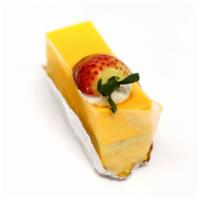 Slc Mango Mousse 切片芒果慕斯 · Vanilla sponge cake with mango mousse layered in between.