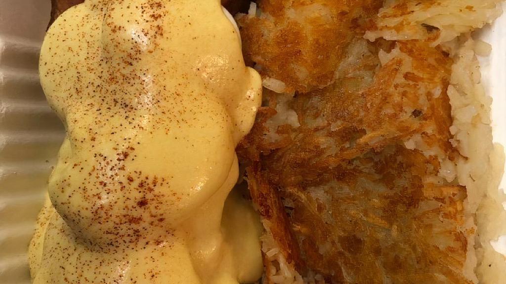 Eggs Benedict · Canadian bacon, two poached eggs over a toasted English muffin topped with hollandaise sauce.