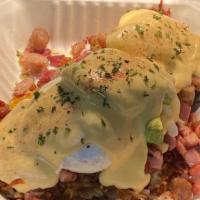 Hash Brown Benedict · Crispy hash browns topped with ham, bacon, sausage, cheddar cheese, avocado, two poached egg...