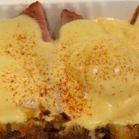 Benedict Arnold · Ham steak (thick cut) and two poached eggs over a toasted English muffin topped with holland...