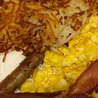 Country Breakfast · Two eggs any style, two strips of bacon, two sausage links and choice of (home fries) homema...