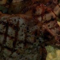 Pork Chops · Two generously cut Pork Chops, seasoned and charbroiled to a well done finish. Style of eggs...
