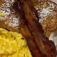 Griddle Combo · Choice of two pancakes, two slices of French toast or a waffle and choice of two sausage or ...
