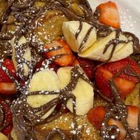 Nutella Deliciousness · Choice of our golden brown waffle or three slices of French 