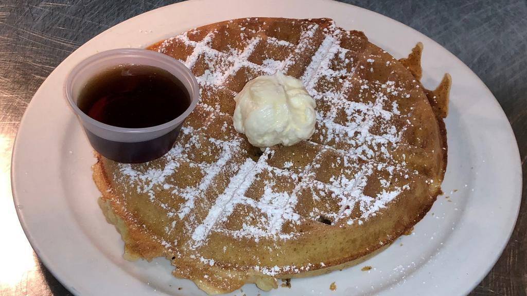 Belgian Waffle · Crisp old fashioned Belgian Waffle. Topped with powder sugar. Served with butter and syrup.